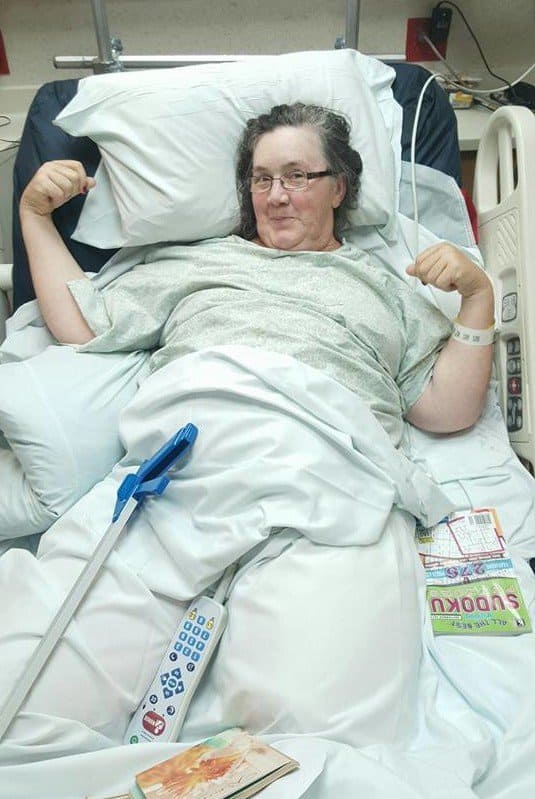 Feeling strong one month after the accident! She just had her PICC line and feeding tube removed when we snapped this picture.